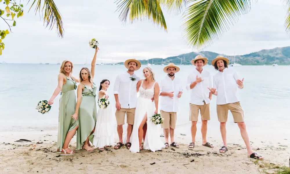 A beachfront wedding party photo at Plantation Island Resort.