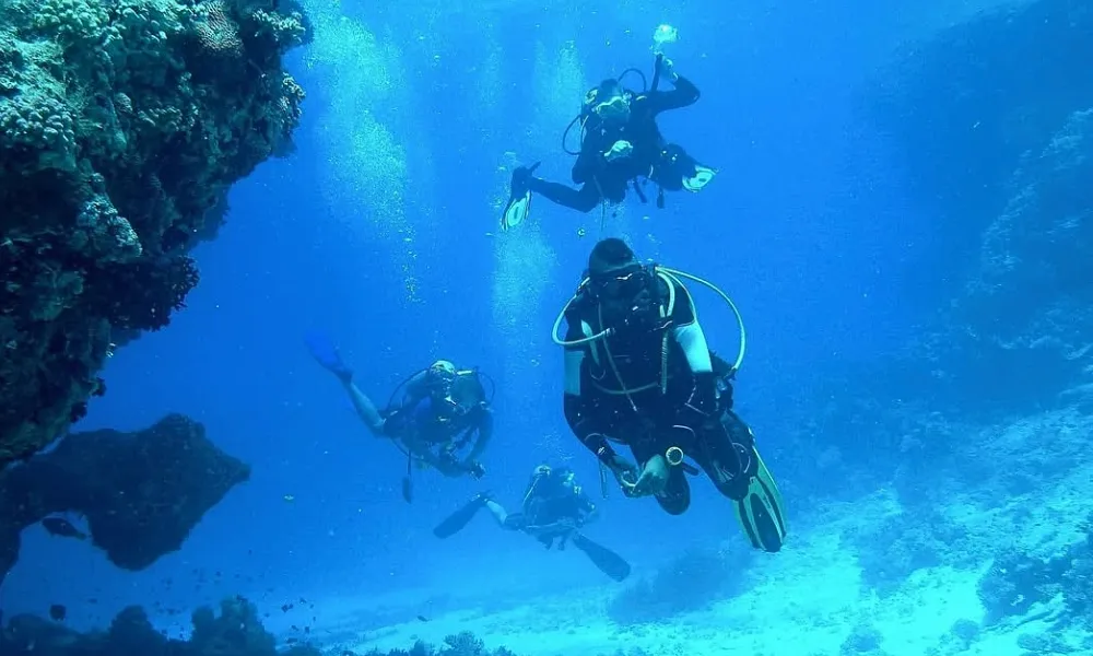 Group of scuba divers exploring the Mamanuca Islands in Fiji