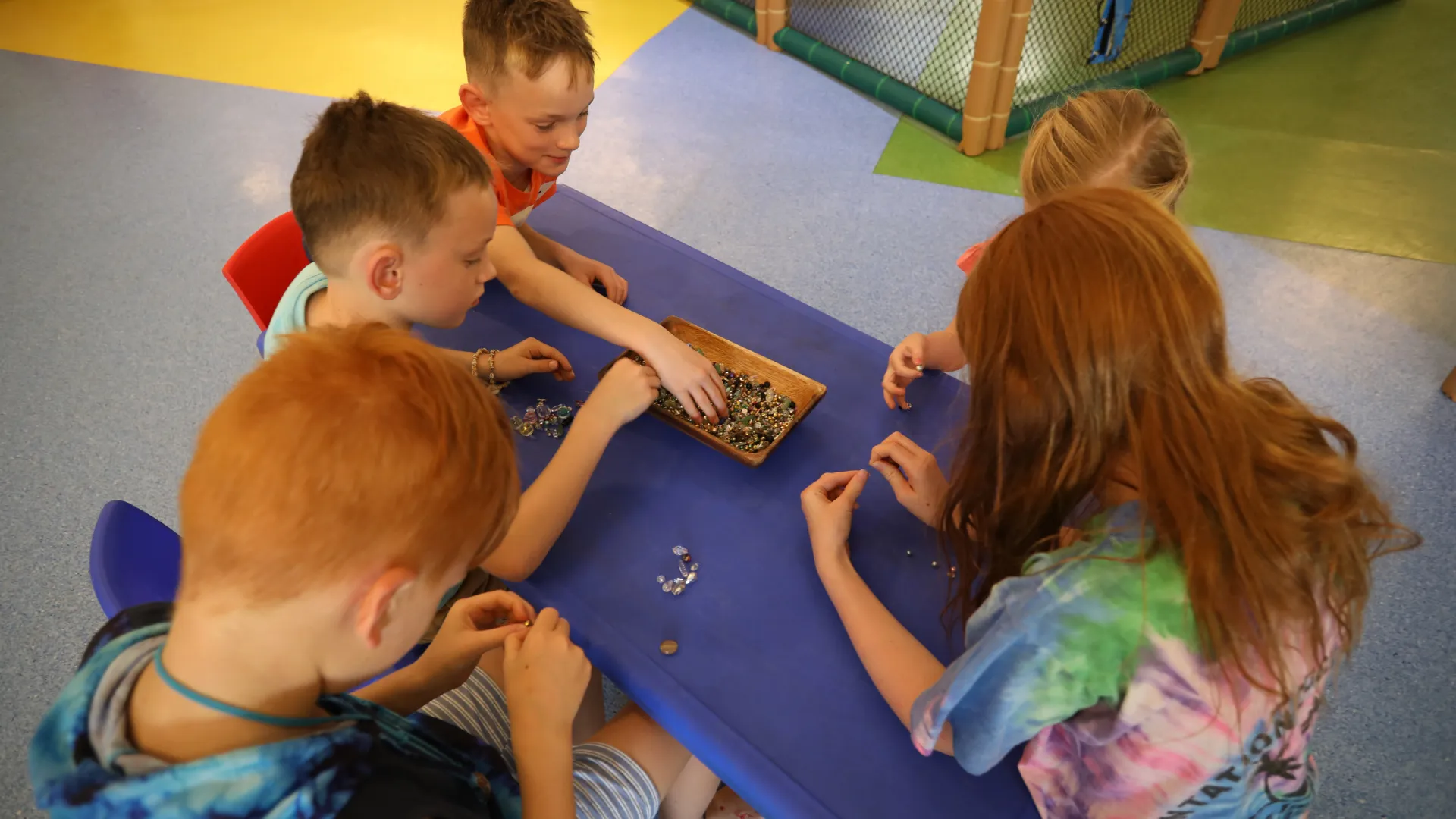 Kids making arts and crafts at the Coconut Kids Club