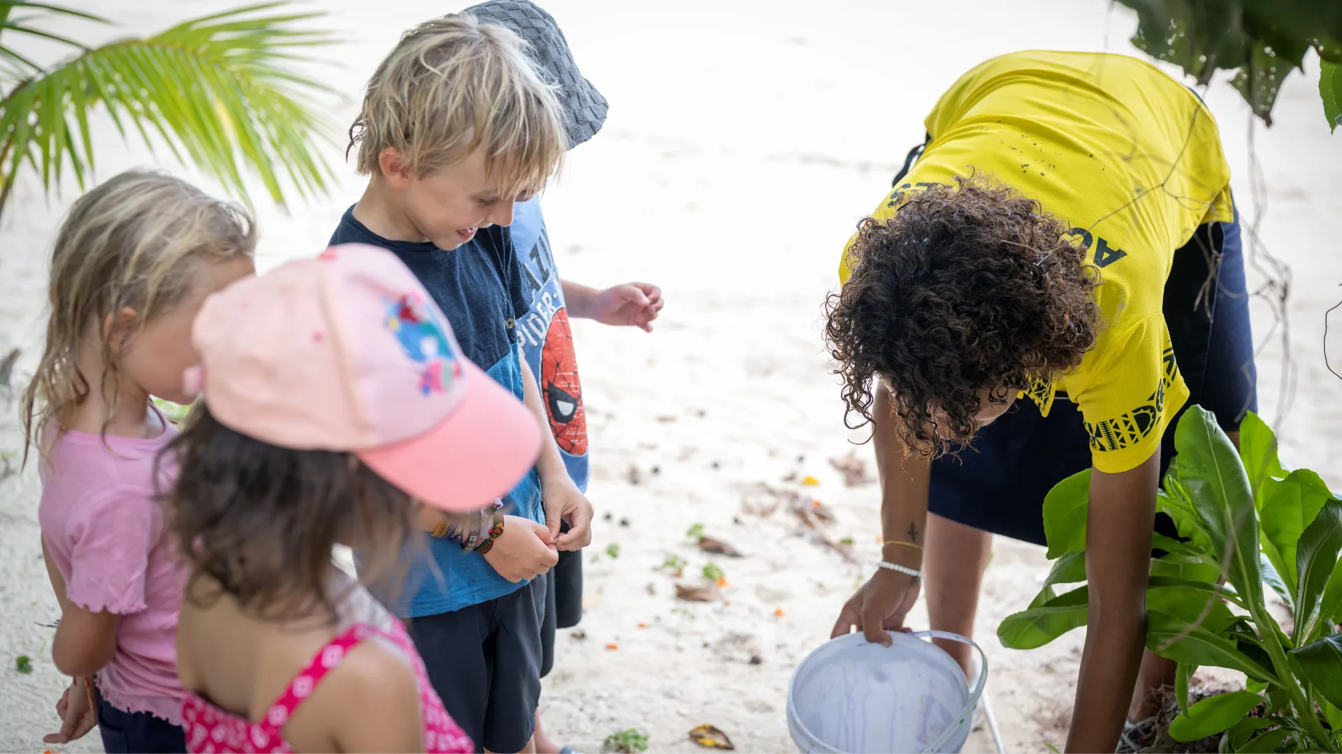 Kids taking part in a crab race at the Coconut Kids Club